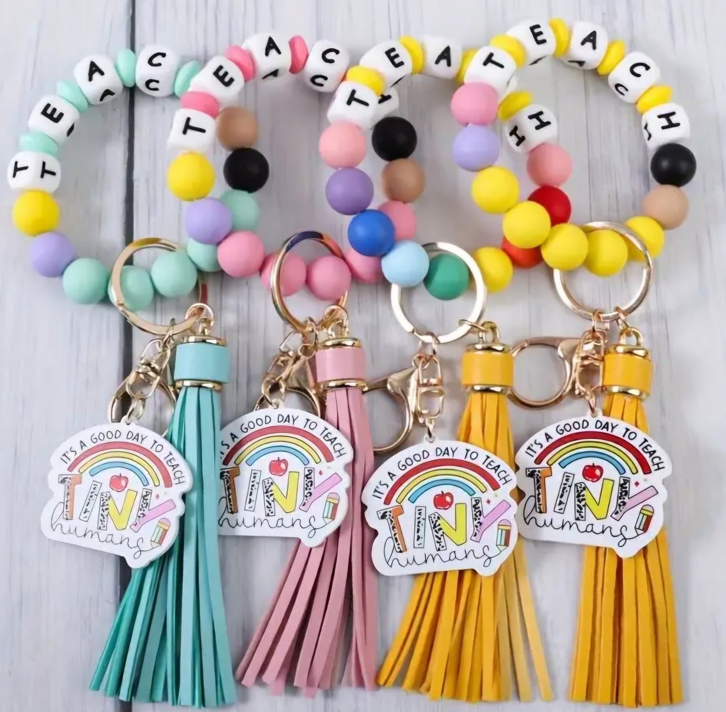 TEACH TINY HUMAN SILICONE BRACELET KEYCHAIN